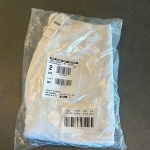 J Crew Petite 26 white denim 9” toothpick jeans.